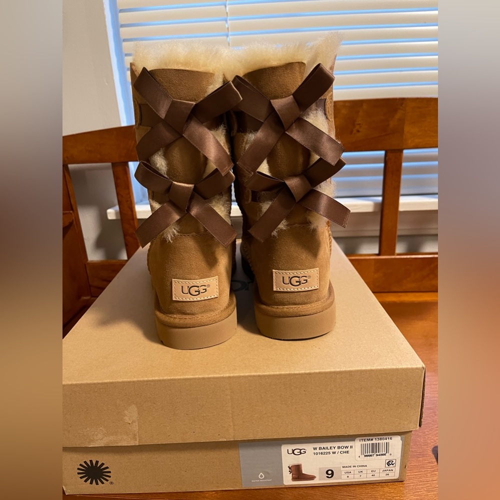 Brand new, never worn Ugg boots with double bow